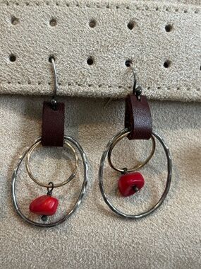 Multi tone metal earrings with red stone accent